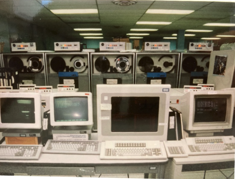 photo displaying four mainframe computers