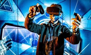 Blue background, person wearing VR mask and holding VR controllers