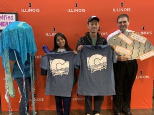students win t-shirt at the Tech Services Phish market event